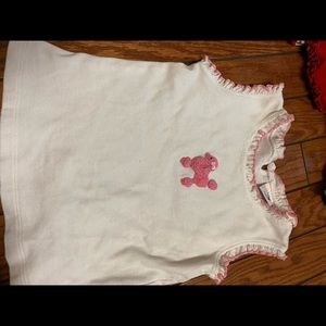 Sleeveless white shirt